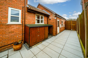 SIDE PAVED AREA WITH GATES TO FRONT- click for photo gallery